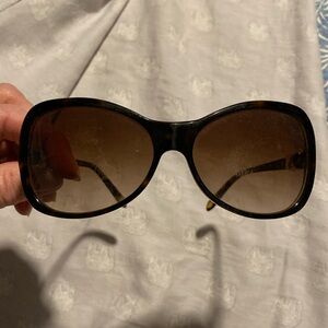 Tiffany & Co sunglasses. Brown torte-she’ll design with gold detail.